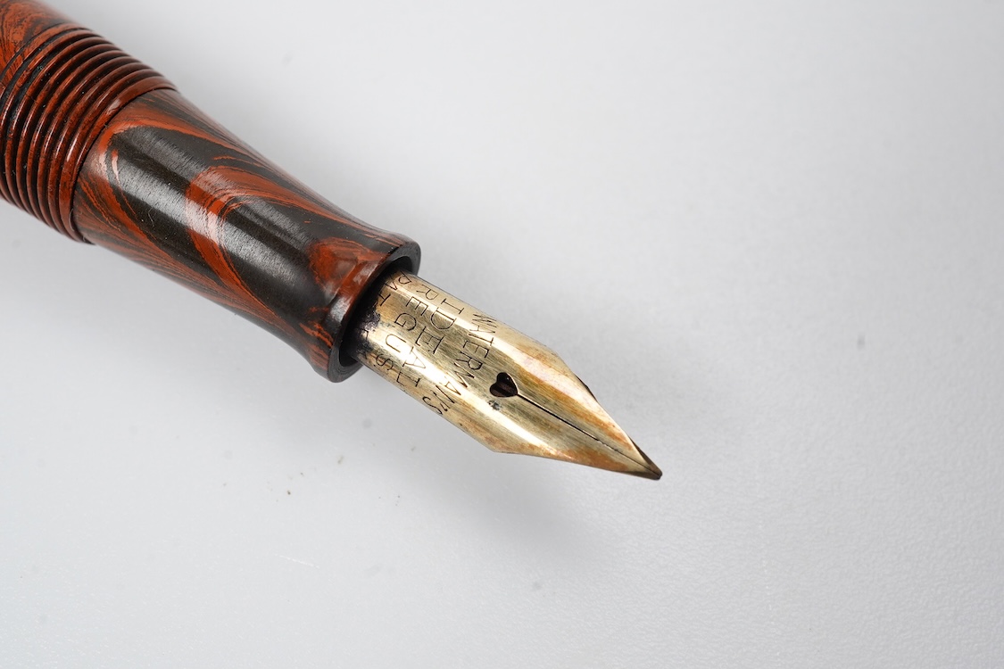 A Waterman Red Ripple No. 5 lever filler with red cap band and fitted with Waterman nib